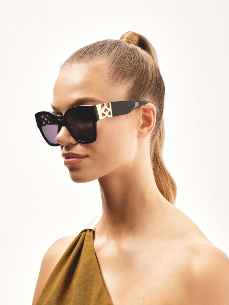 Zwarte zonnebril met versierde poten ISLE