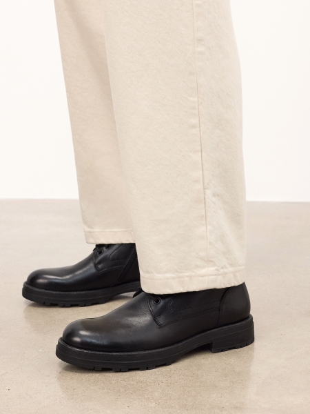 Zwarte laarzen met rits en binding PAVELLI