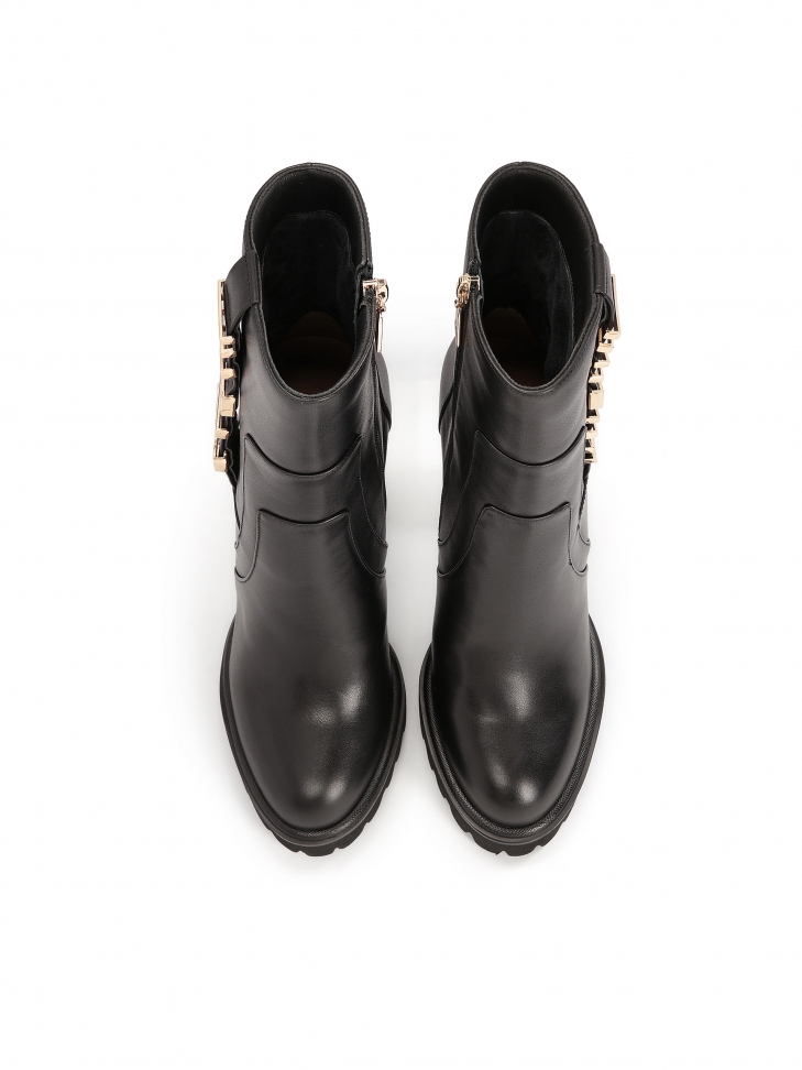 Leren laarzen met matte hak versierd met letters MORENA