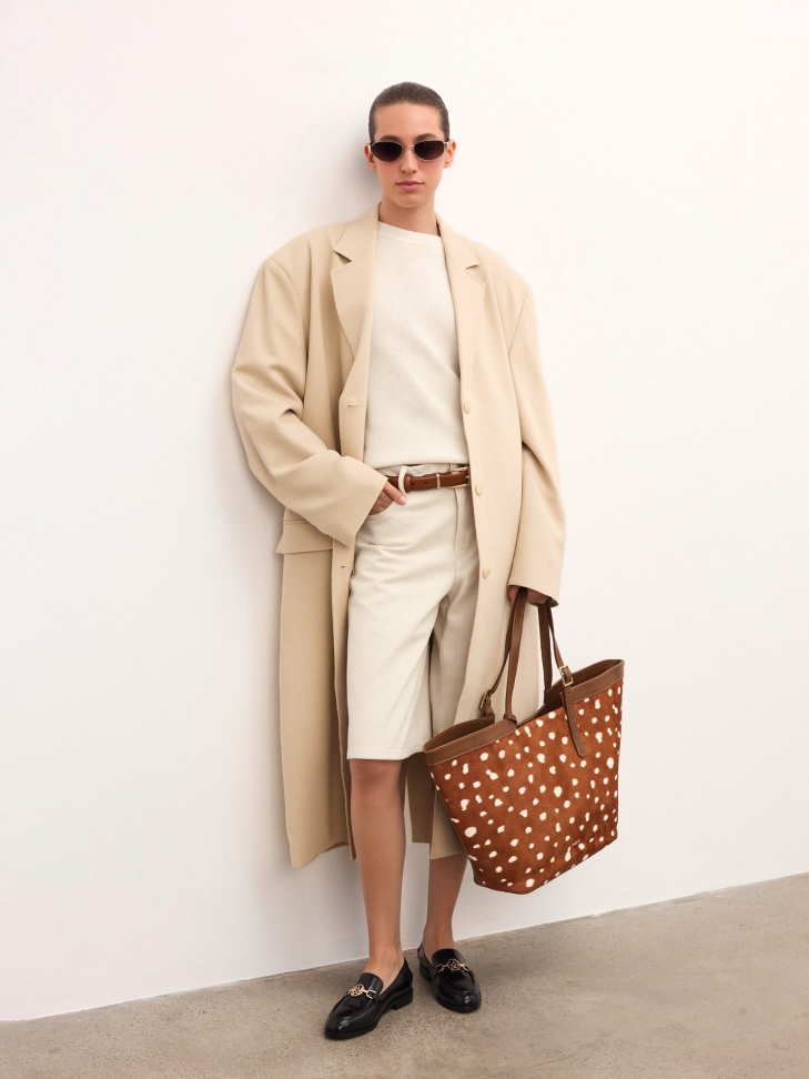 Zwarte instappers met metalen versiering NERITA