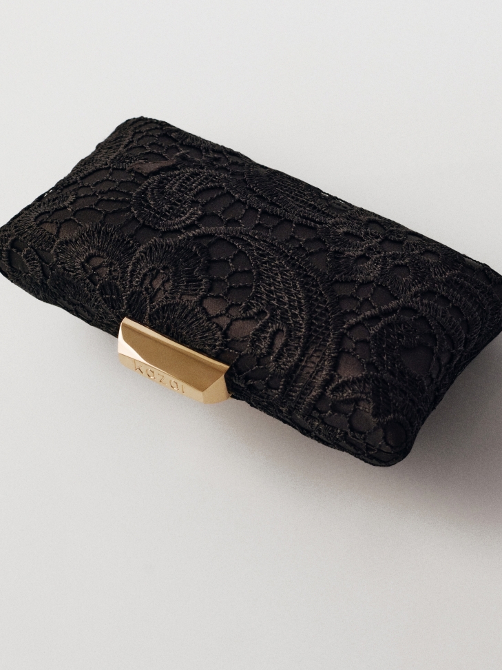 Elegante zwarte clutch tas bedekt met guipure CARI
